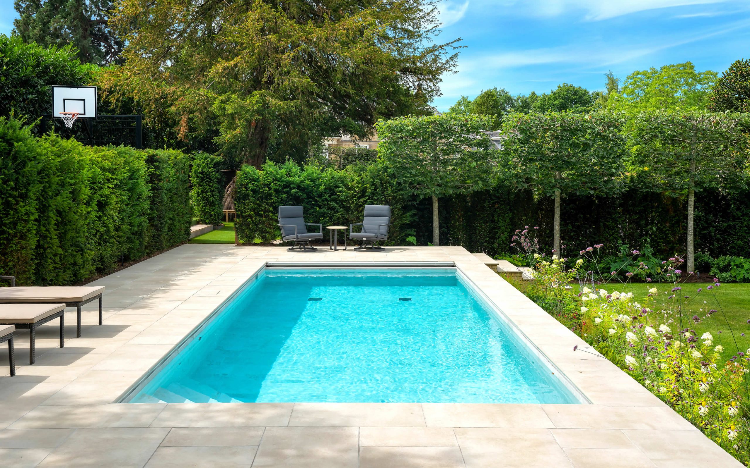 Cobham Surrey beautiful contemporary-swimming-pool-design-vibrant-planting