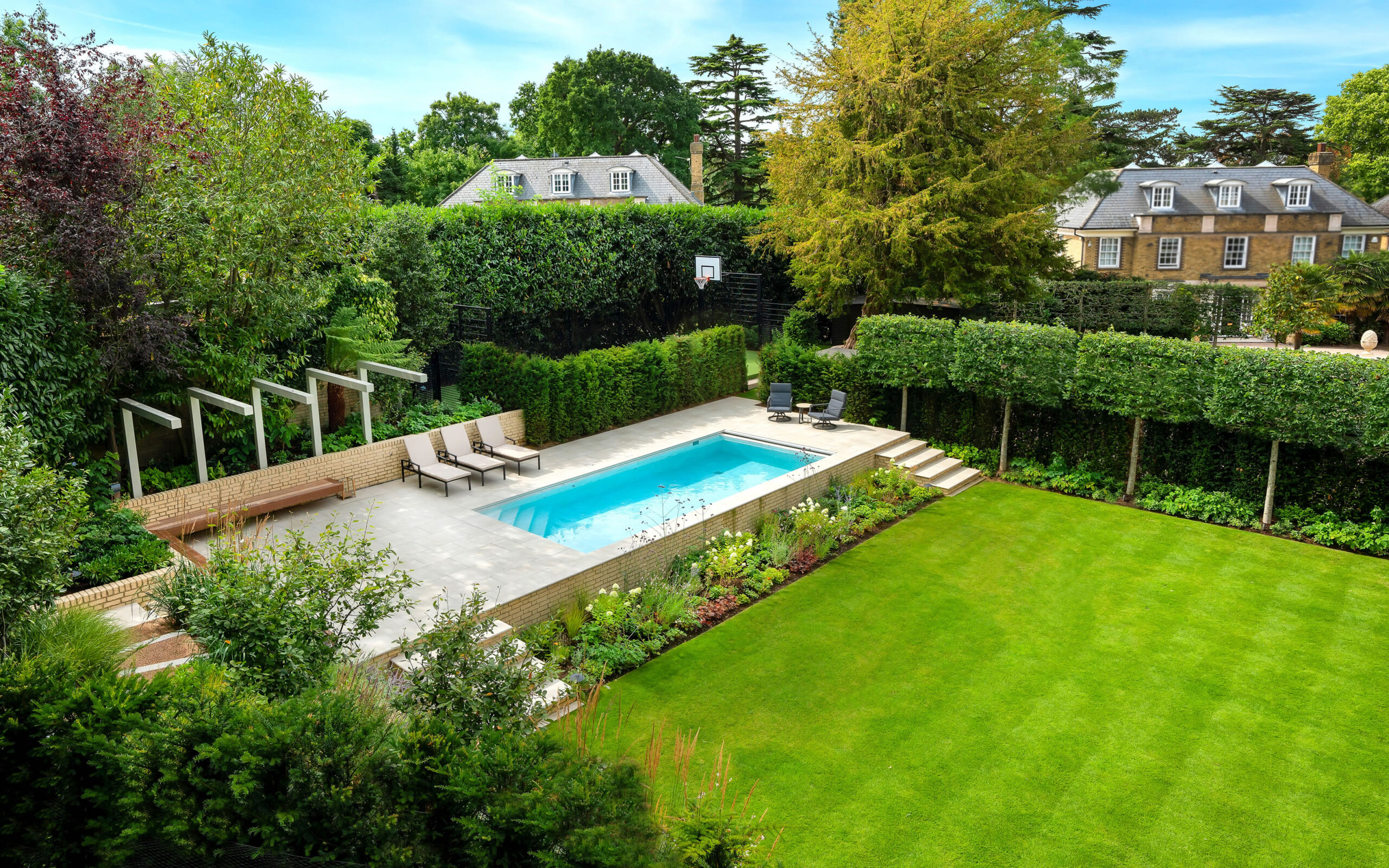 Cobham-Surrey-swimming-pool-terrace-garden-design