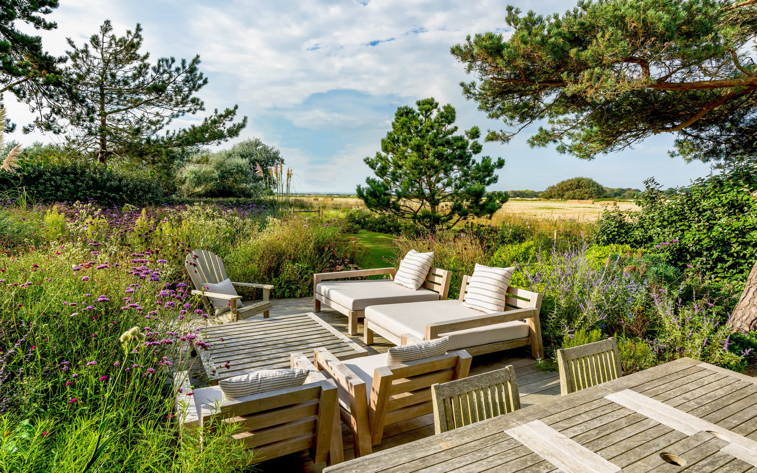 West Sussex West Wittering contemporary informal grass planting design seating area