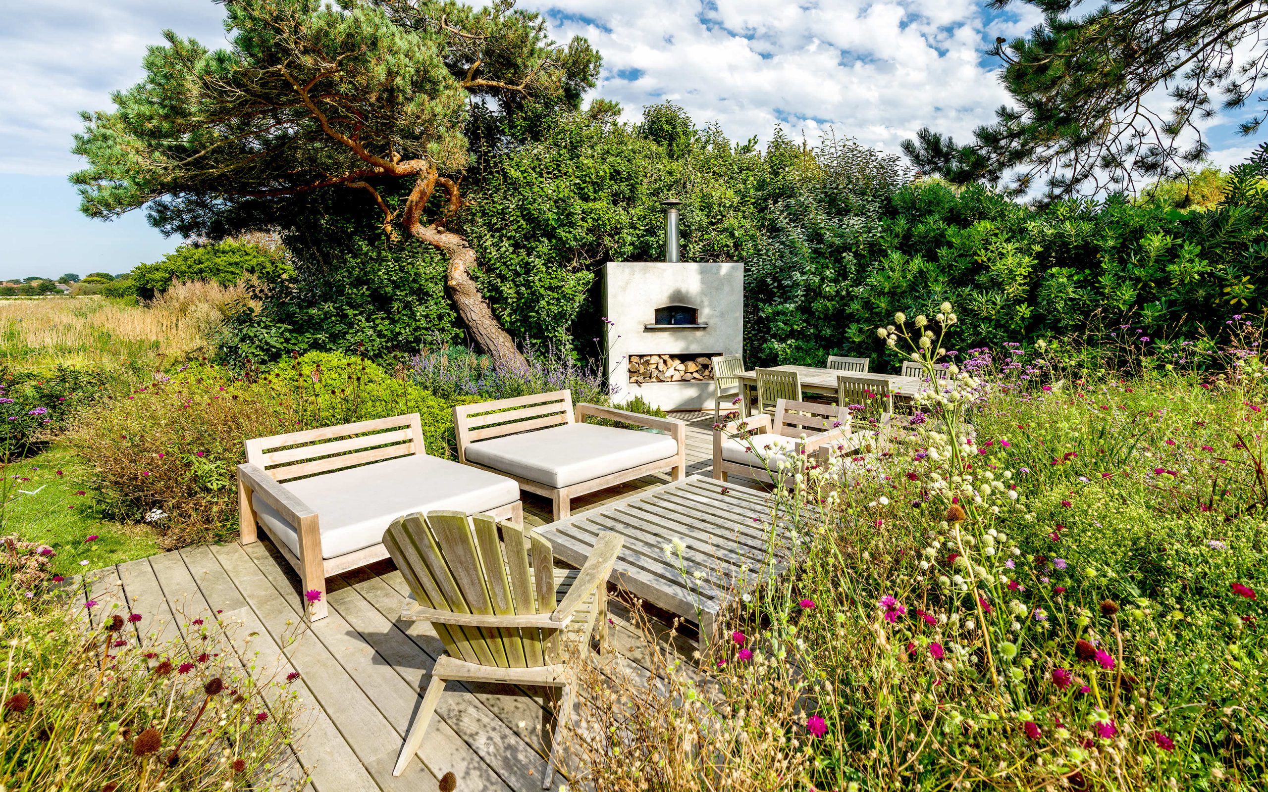 West Sussex West Wittering grass planting modern social garden room